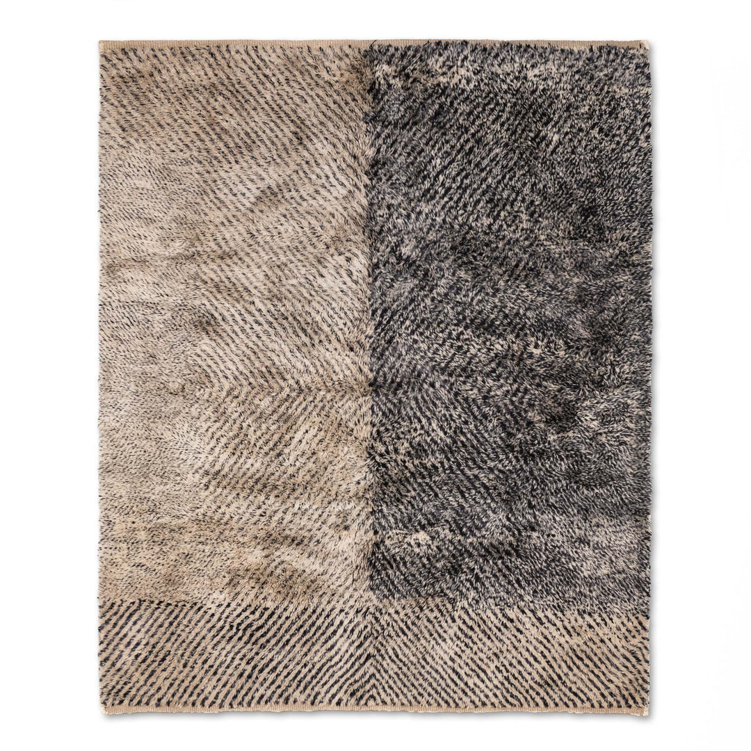 Handmade Beni Mrirt Moroccan wool rug with split-tone ivory and charcoal design, perfect as a modern area rug for home decor.