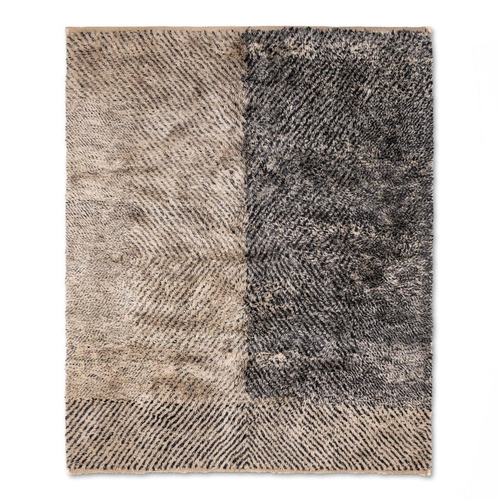 Handmade Beni Mrirt Moroccan wool rug with split-tone ivory and charcoal design, perfect as a modern area rug for home decor.