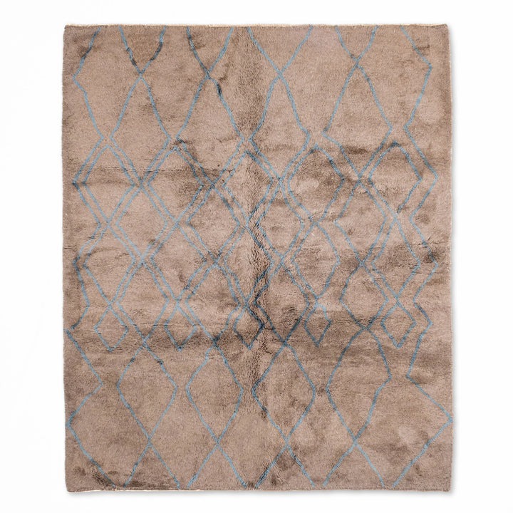 Handmade Moroccan rug with traditional Berber diamond pattern in blue, perfect for modern interiors; available as wool area rug.