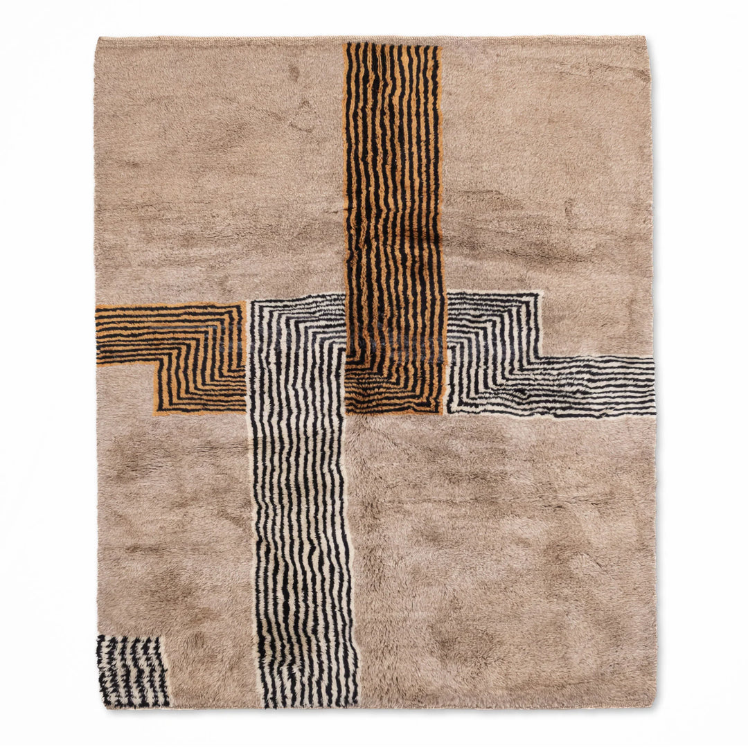 Handmade Moroccan wool rug with geometric line pattern, showcasing traditional Berber design. Perfect as a Moroccan runner rug or shag rug.