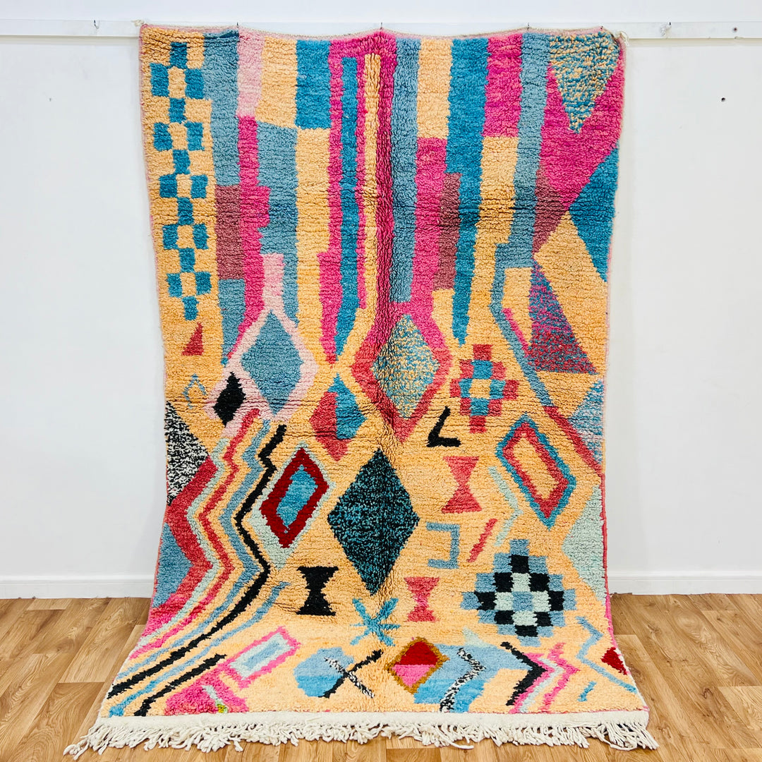 Vintage Moroccan Berber rug with pink, turquoise diamonds, handcrafted wool, perfect for modern boho interiors - 8.5x5.3ft