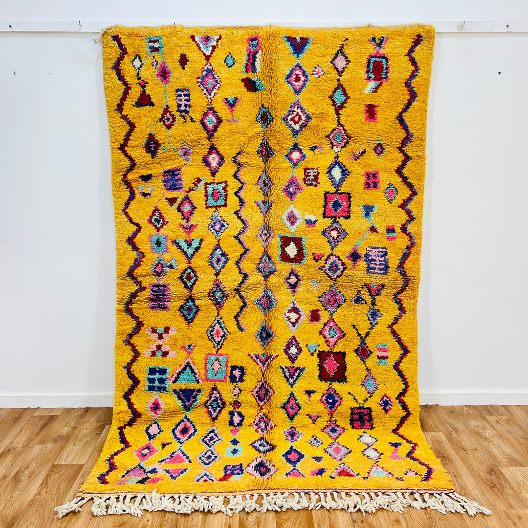 Yellow Moroccan Berber Rug with colorful geometric patterns, size 254x157 cm, ideal for vibrant home decor.
