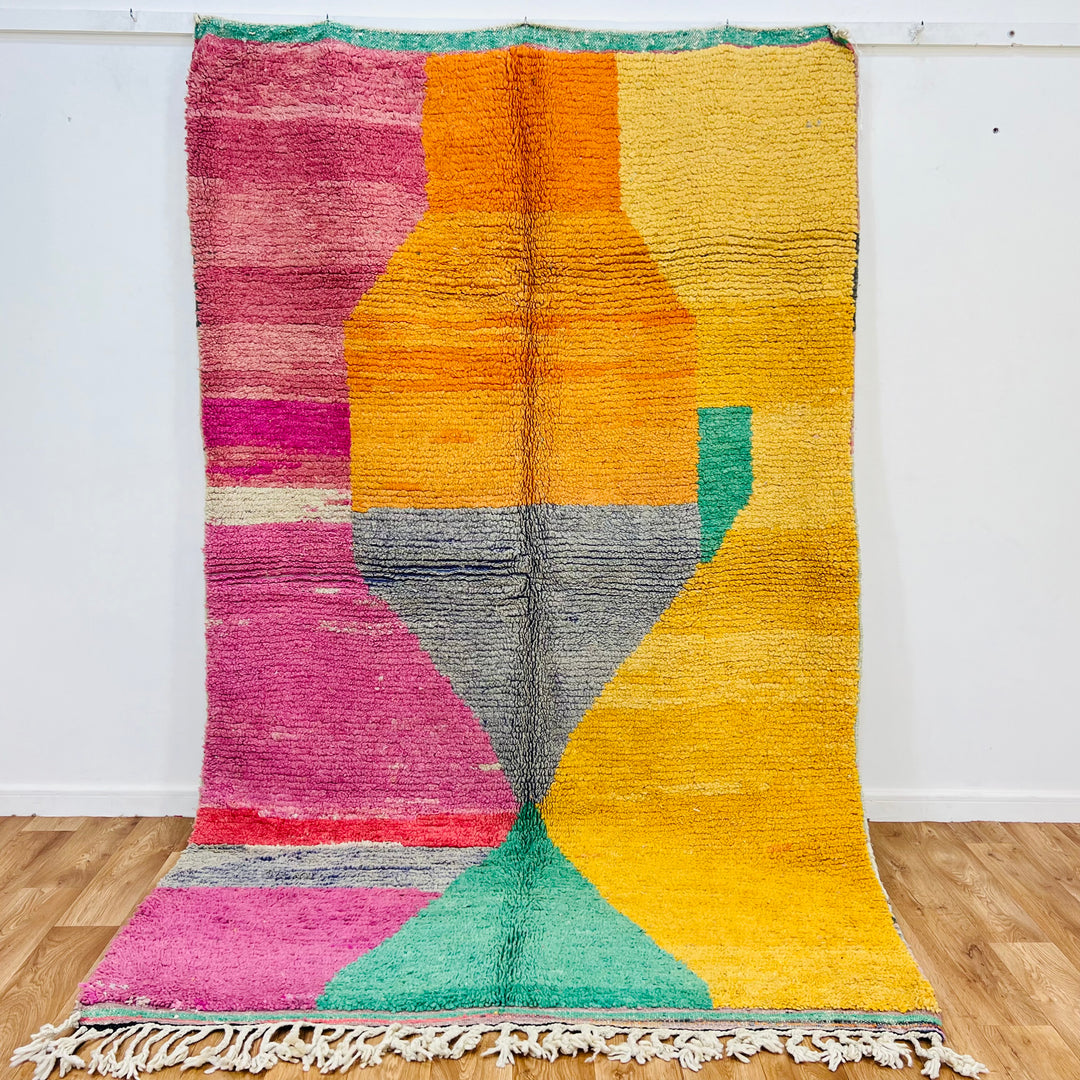 Rare vintage Moroccan abstract rug with vibrant hues of orange, pink, yellow, and mint green, handwoven by Berber artisans.