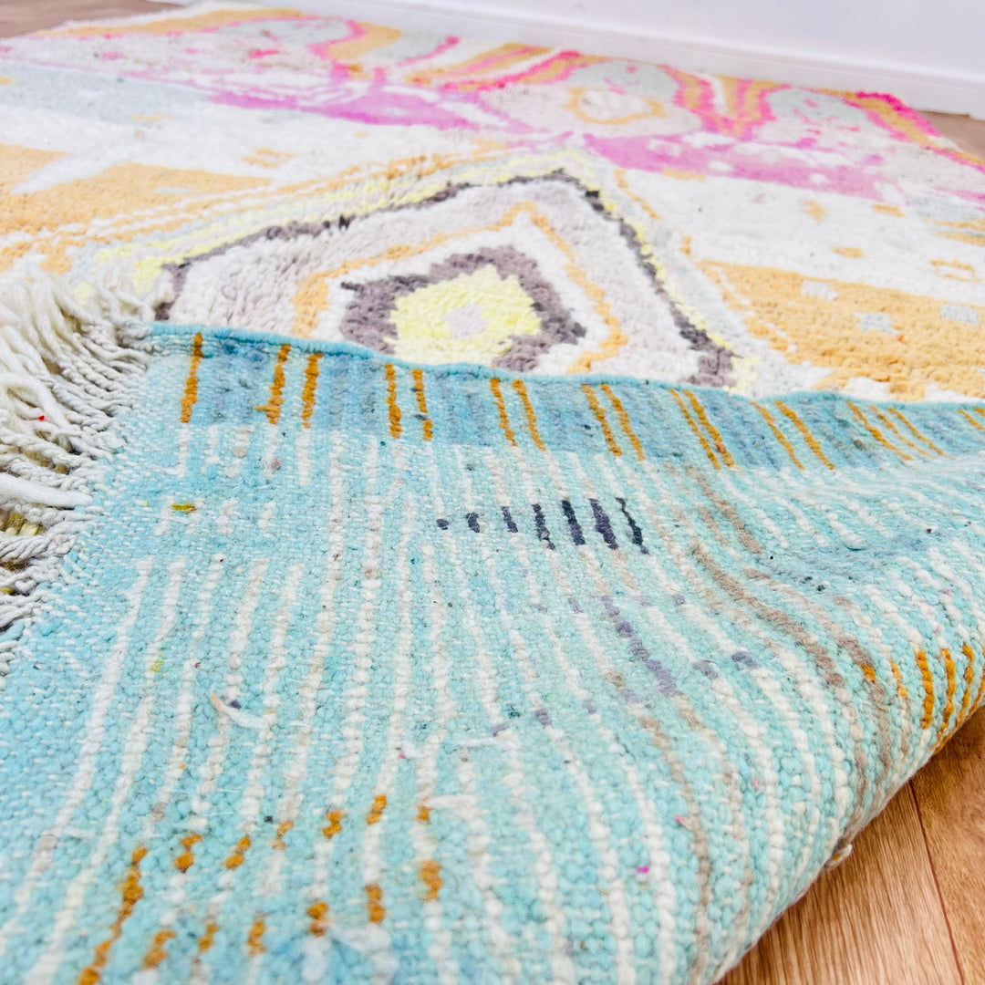 Pastel Diamond Vintage Moroccan Rug 246x150 cm with central diamond, vibrant pink, gold, gray tribal motifs, handwoven wool.
