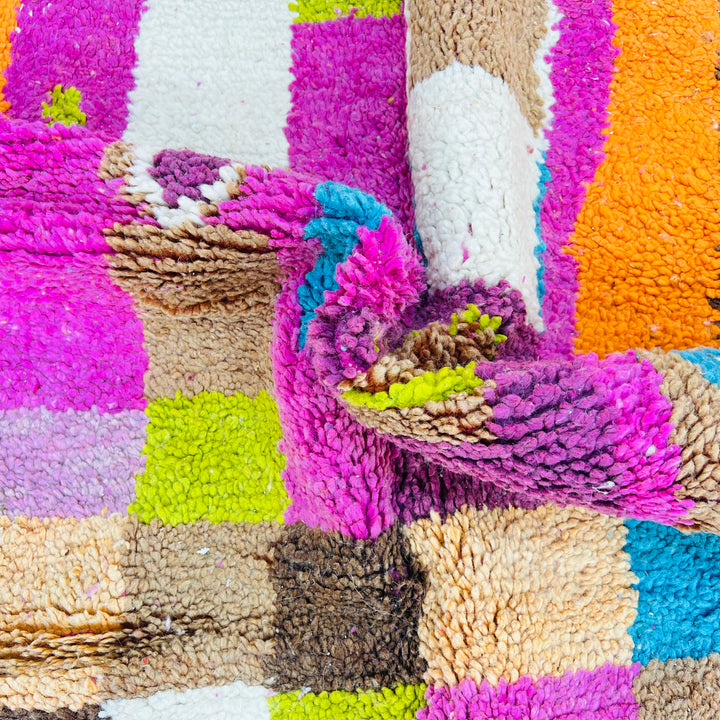 Vintage Moroccan rug with vibrant pink, orange, teal colors and Berber symbols, 100% wool, 247 x 157 cm.