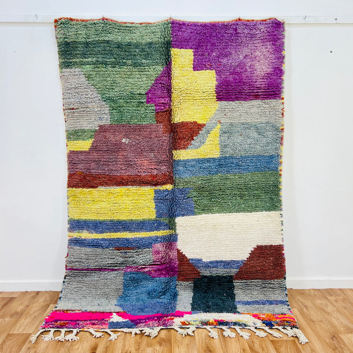 Handwoven vintage Moroccan rug with abstract color blocks in green, purple, yellow, and blue (231×152 cm) by Berber artisans