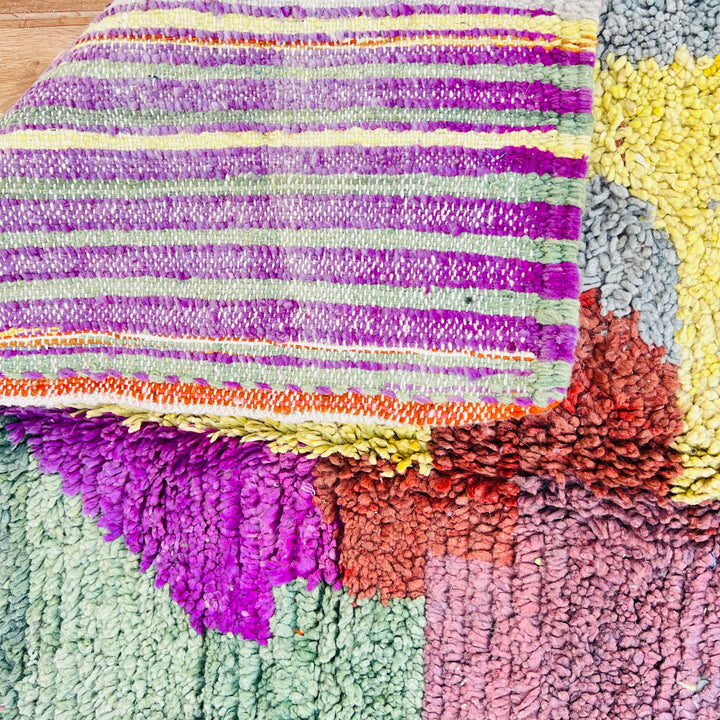 Color block vintage Moroccan rug, abstract design in green, purple, yellow, and burgundy, handwoven by Berber artisans, 231 × 152 cm.