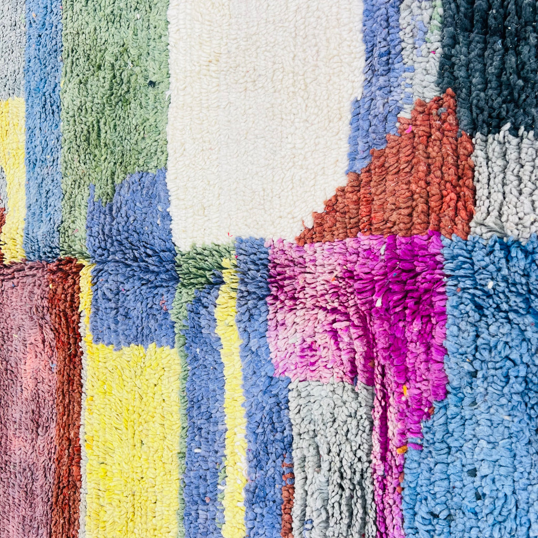 Color block vintage Moroccan rug with green, purple, yellow, cream, blue, burgundy abstract design. Handwoven wool by Berber artisans.