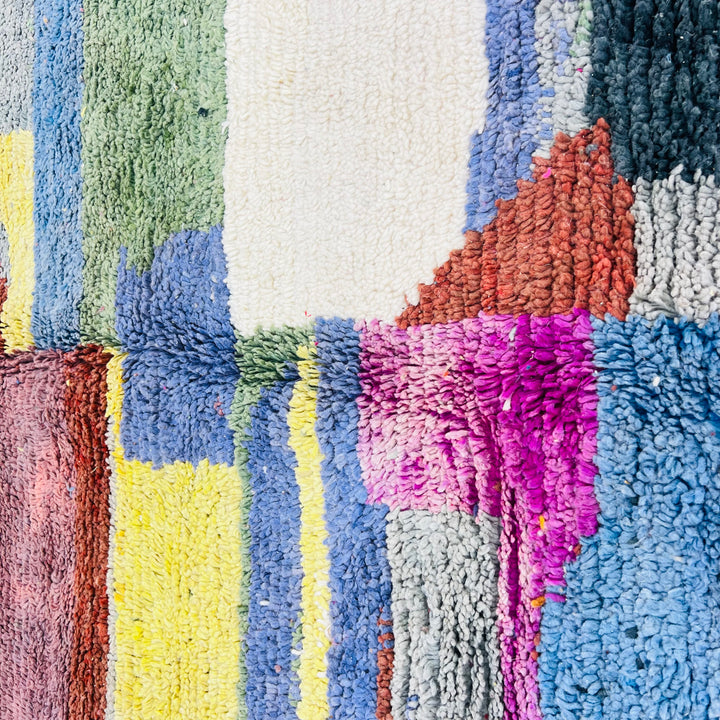Color block vintage Moroccan rug with green, purple, yellow, cream, blue, burgundy abstract design. Handwoven wool by Berber artisans.