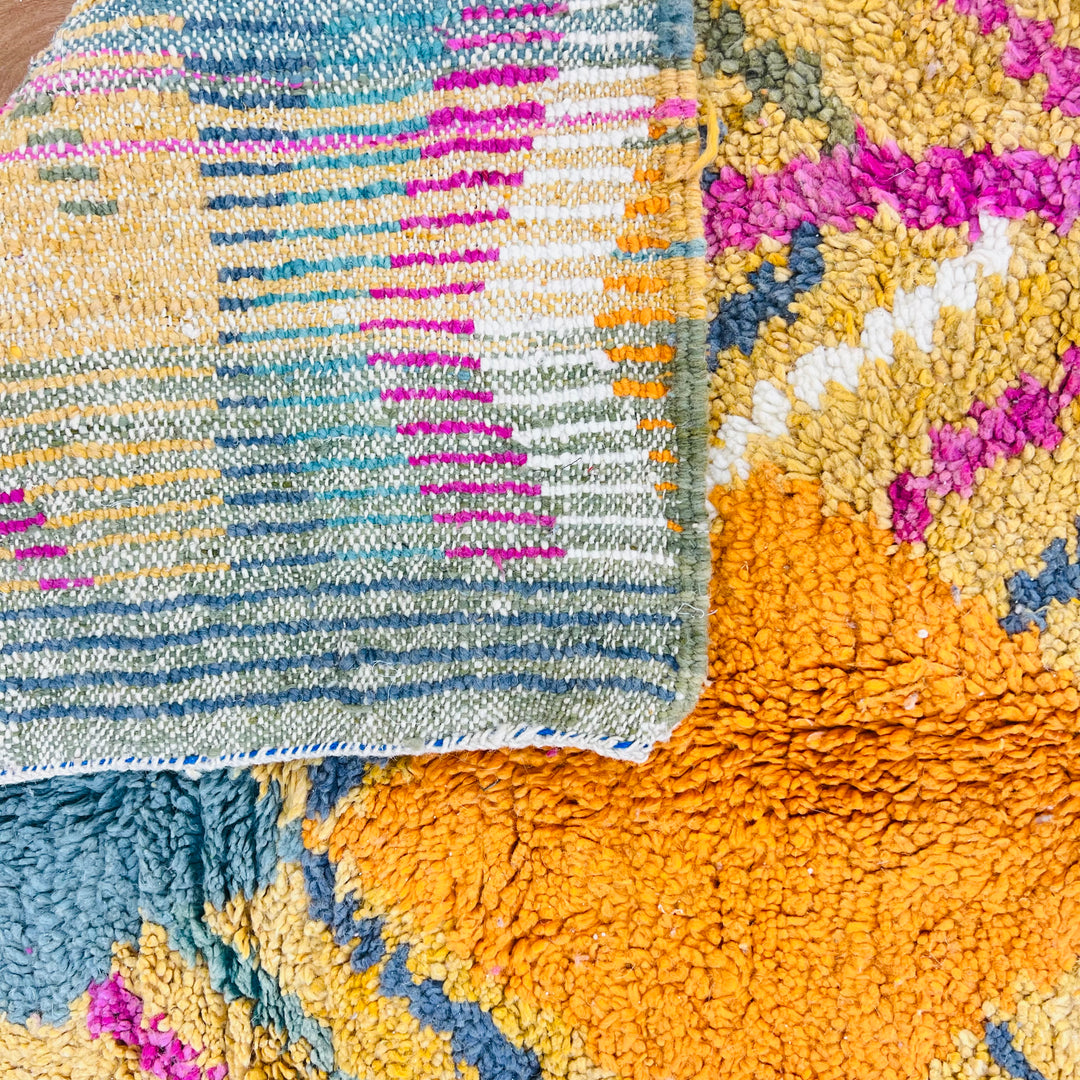 Colorful vintage Moroccan wool rug with ochre, fuchsia, and teal patterns, handwoven by Berber women. Moroccan rug 8x10.