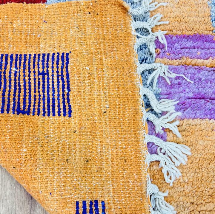 Vintage Moroccan wool rug No. 366 with geometric shapes in pink, orange, blue, and red – 245x160 cm