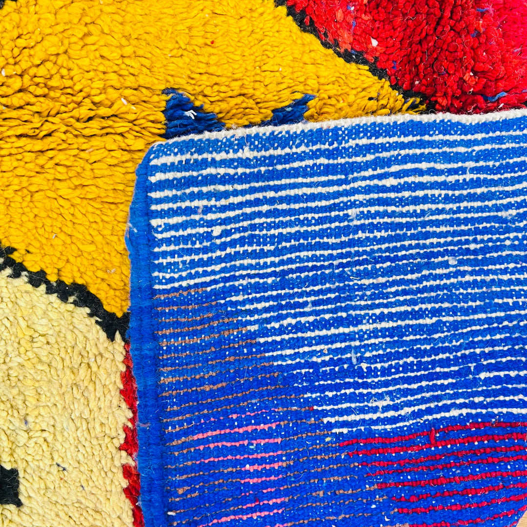 Vintage Moroccan rug 240x165 cm with bold red, yellow, and blue geometric pattern – Rug 651