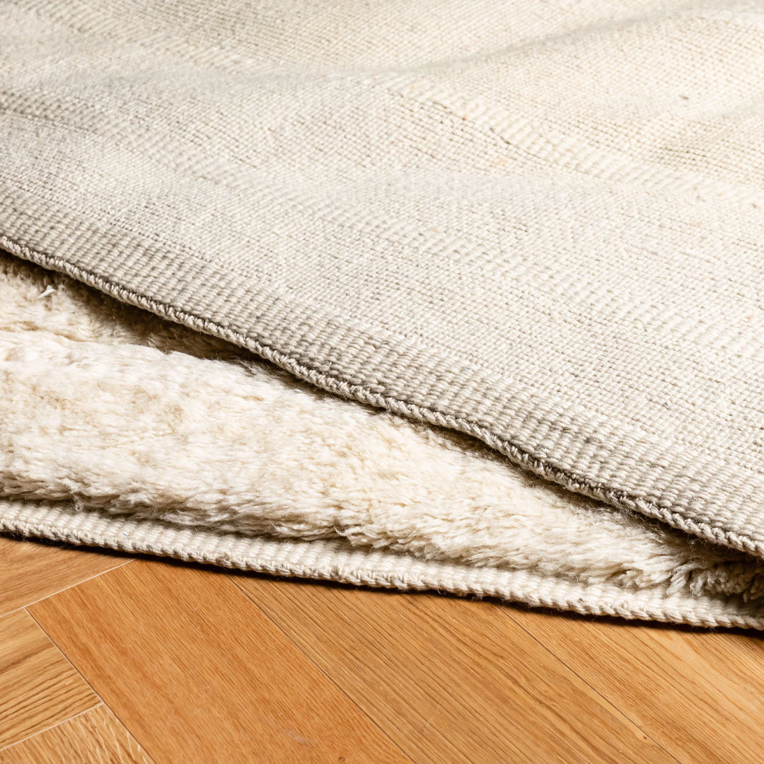 Ivory Beni Mrirt Moroccan wool rug with minimalist design, ideal for Scandinavian or Japandi-inspired interiors.