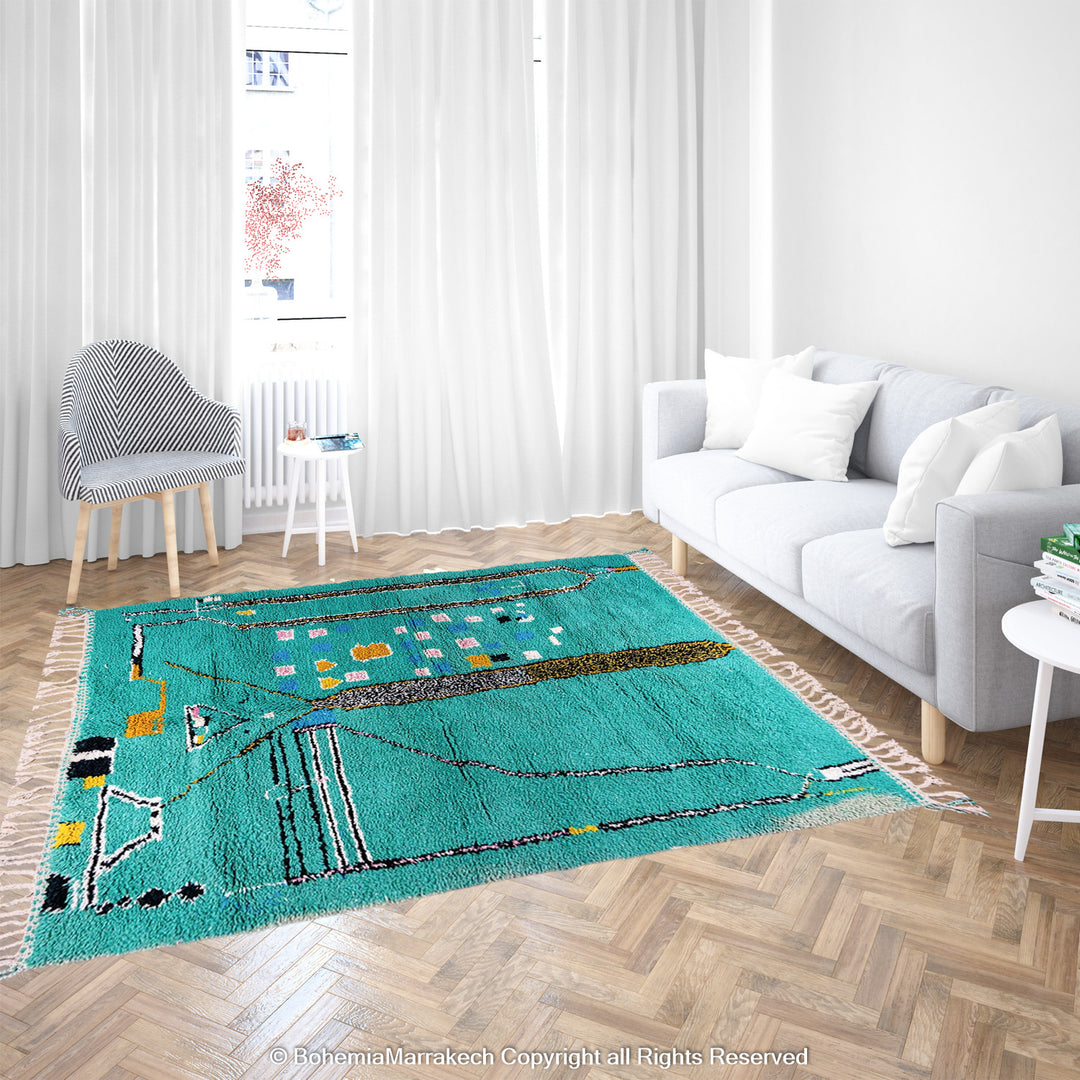 Handwoven green Moroccan Boujad rug with abstract Berber lines and colorful wool symbols