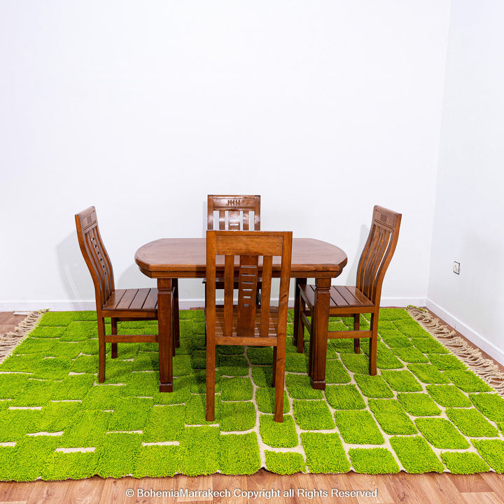 Handmade Moroccan rug in green checkered brick design, crafted from soft wool by Berber artisans