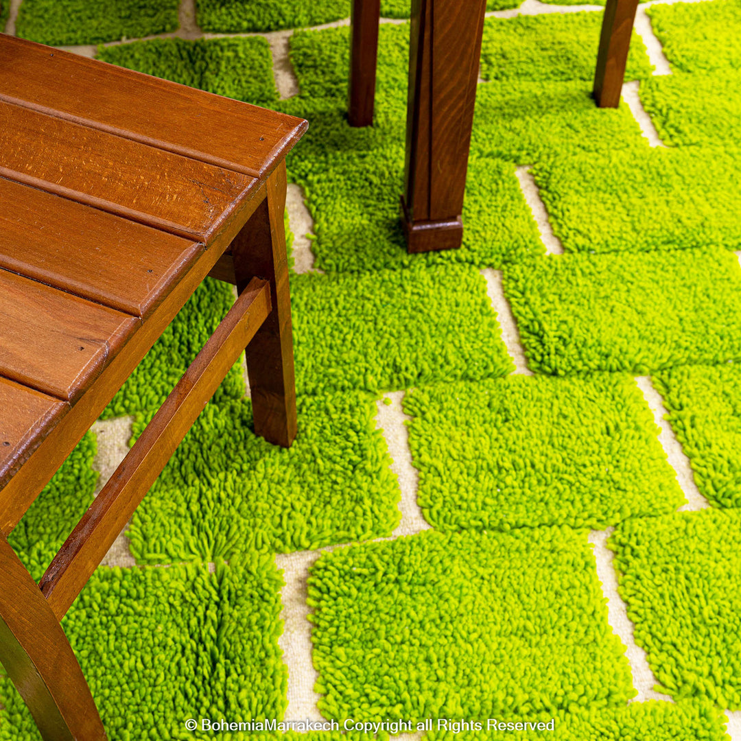 Handmade Moroccan rug in green checkered brick design, crafted from soft wool by Berber artisans