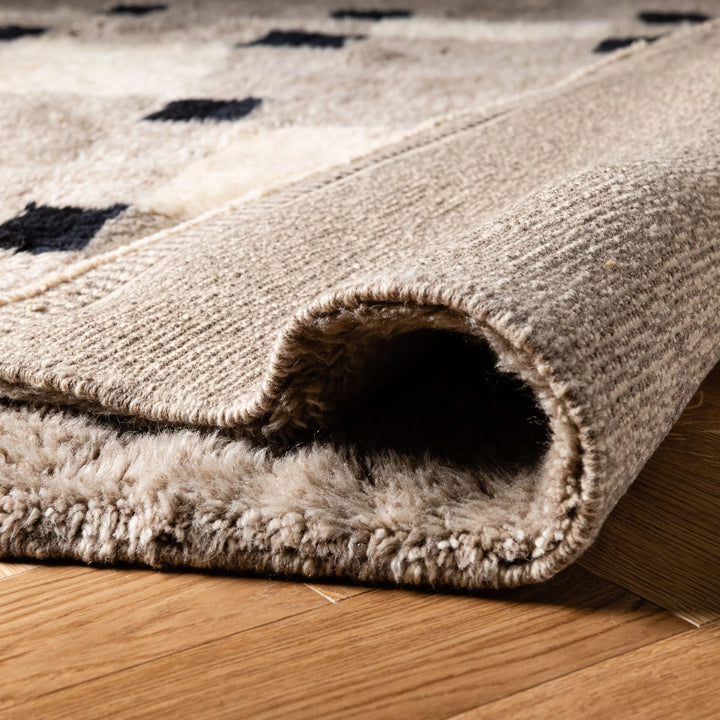 Minimalist checkered Moroccan Berber wool rug with geometric pattern, elegant and modern, showcasing detailed craftsmanship.