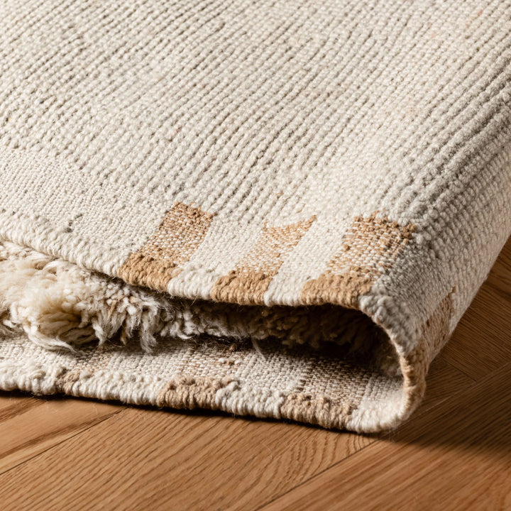 Minimalist Cream Moroccan Beni Mrirt Rug with X-shaped design, handcrafted from natural wool, perfect for modern interiors.
