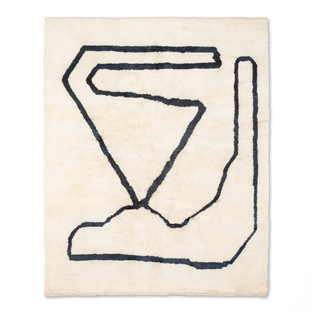Modern Beni Mrirt Moroccan rug with bold black abstract lines on creamy wool, showcasing traditional craftsmanship, 8x10 area rug.