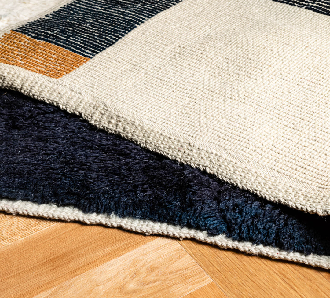 Modern Geometric Beni Mrirt Rug in black, ivory, and amber blocks; Moroccan wool rug perfect for contemporary interiors.
