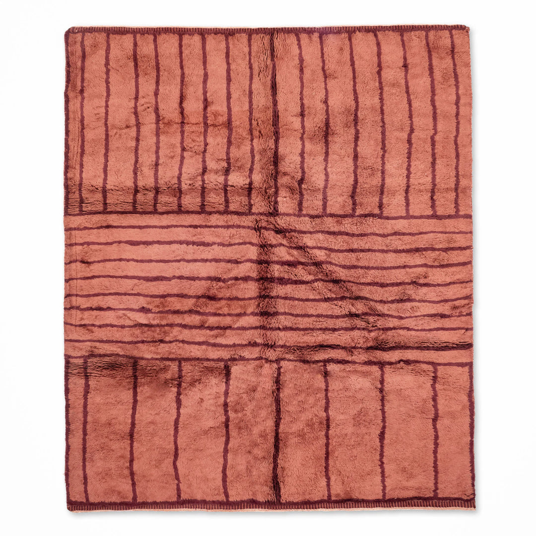 Terracotta Beni Mrirt rug, handwoven Moroccan Berber art with geometric stripes, premium wool, perfect for living rooms or offices.
