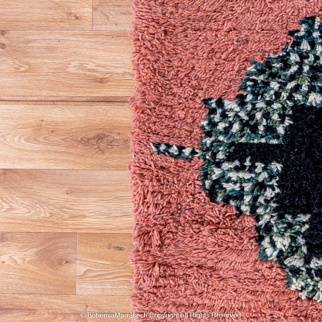 Colorful Moroccan Beni Ourain rug with diamond patterns, handmade from wool by Berber women