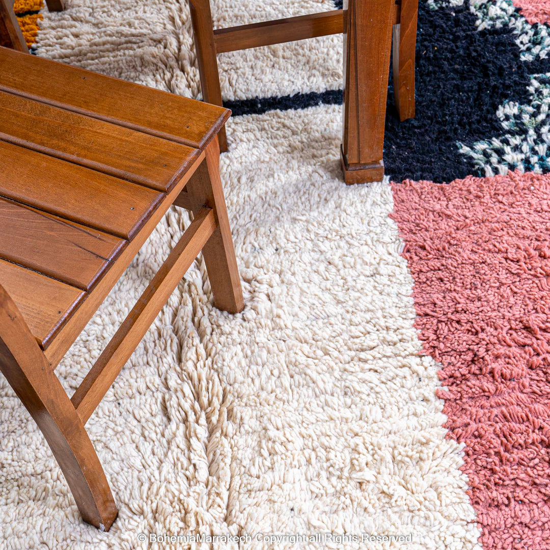 Colorful Moroccan Beni Ourain rug with diamond patterns, handmade from wool by Berber women
