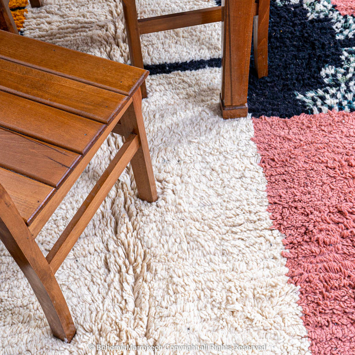 Colorful Moroccan Beni Ourain rug with diamond patterns, handmade from wool by Berber women