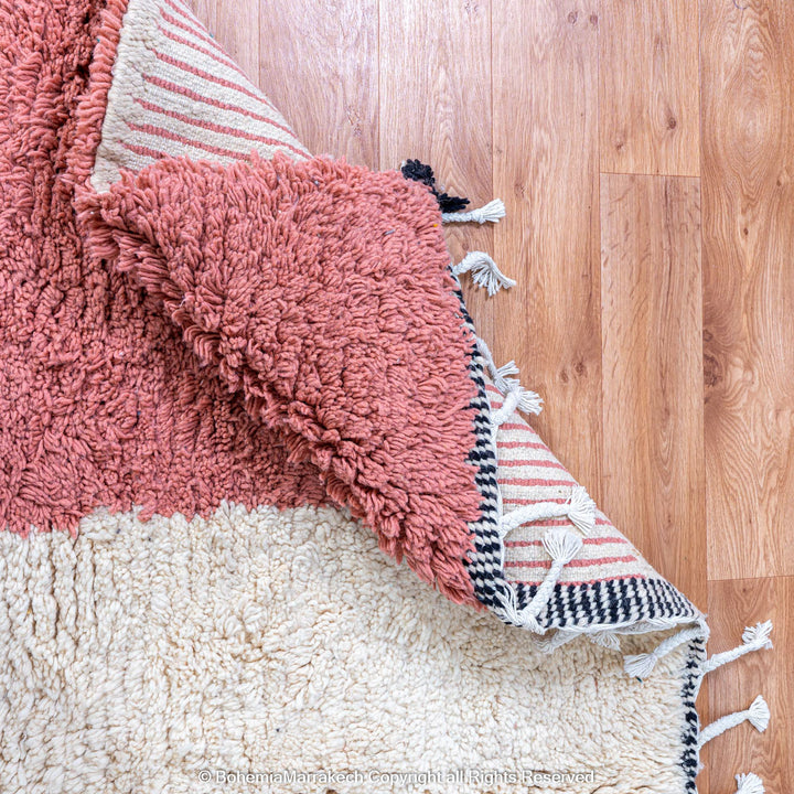 Colorful Moroccan Beni Ourain rug with diamond patterns, handmade from wool by Berber women