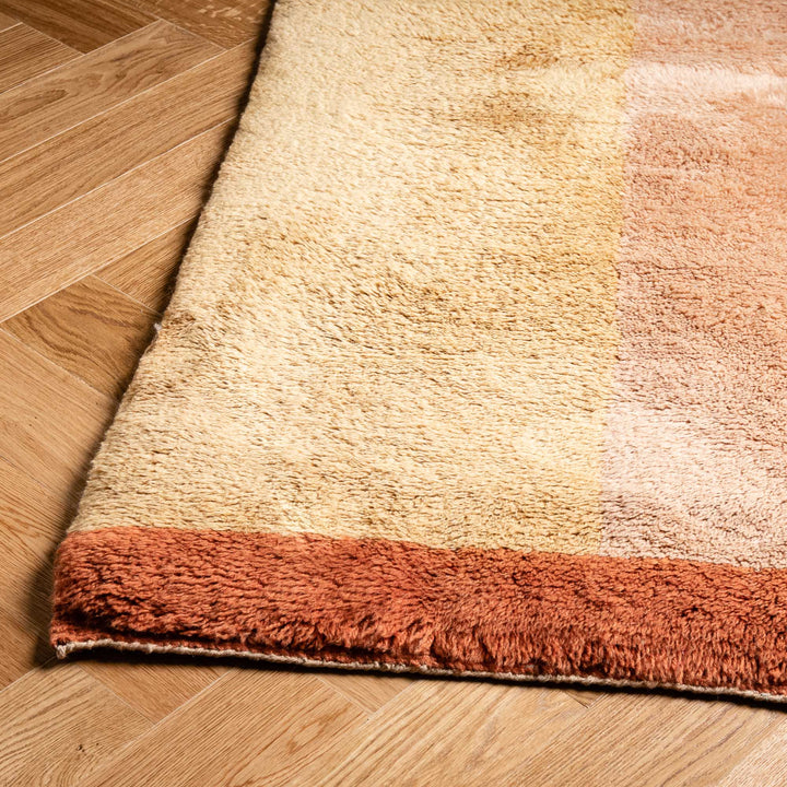 Custom Moroccan runner rug in warm earthy tones with a traditional Berber pattern, handwoven from 100% natural wool.