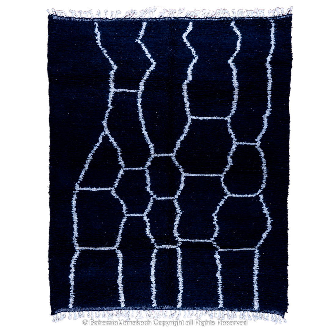 Solid black Moroccan rug with hand-knotted white tribal lines