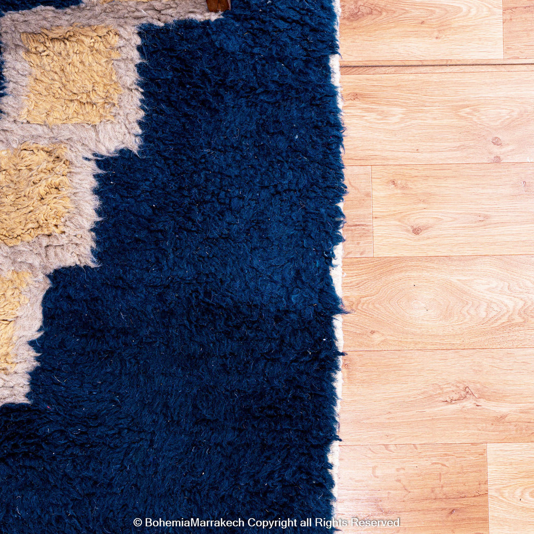Deep blue Moroccan wool rug with ivory geometric diamond design – handmade Berber shag rug