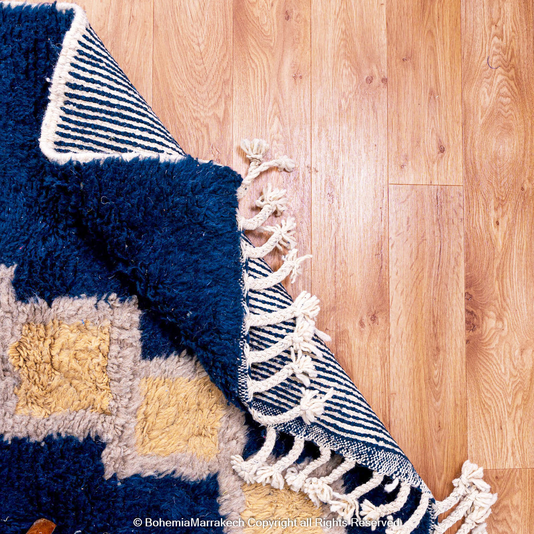 Deep blue Moroccan wool rug with ivory geometric diamond design – handmade Berber shag rug