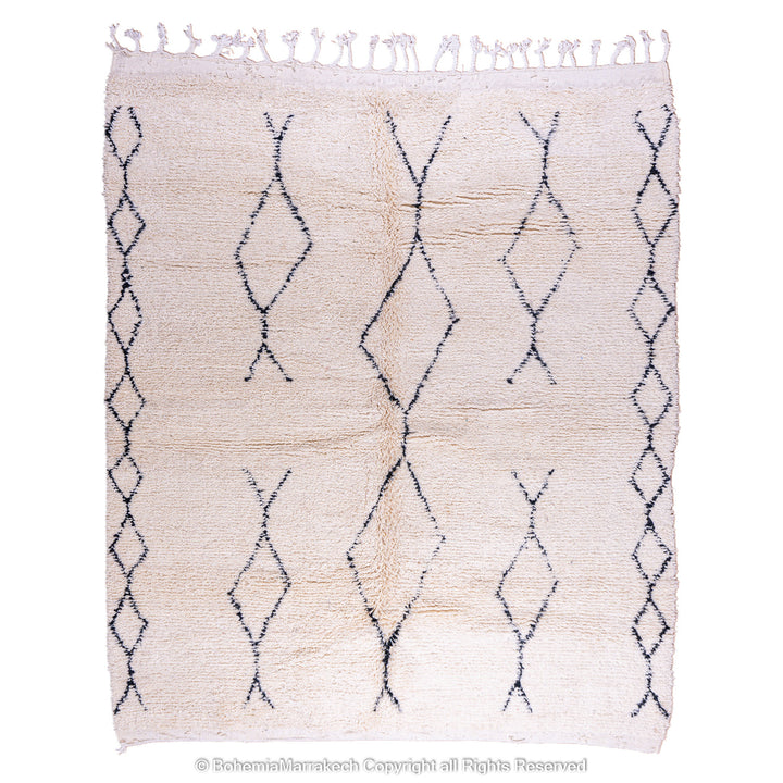 Handmade Beni Ourain Moroccan rug with black diamond pattern on ivory wool