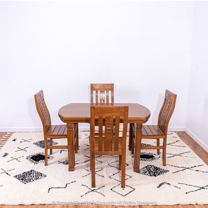 Hand-knotted Beni Ourain Moroccan rug with black tribal diamond patterns on white wool background