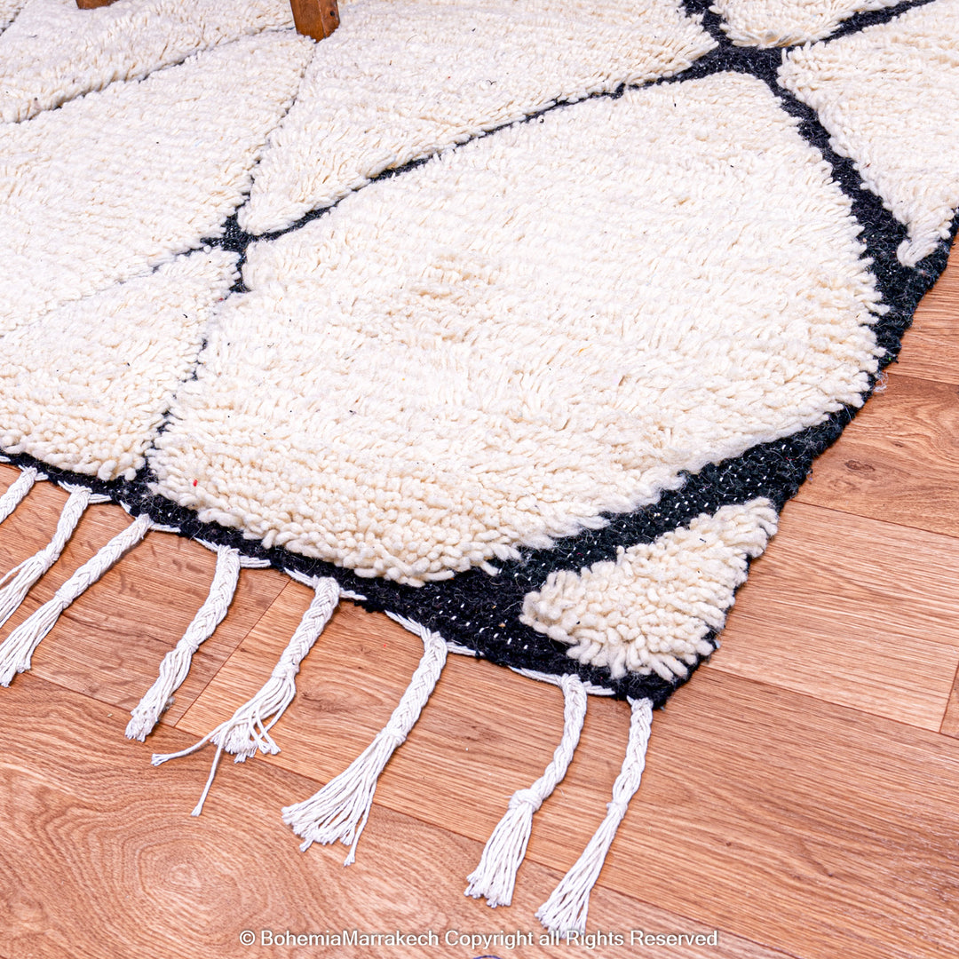 Hand-knotted Beni Ourain Moroccan wool rug in black and white diamond pattern
