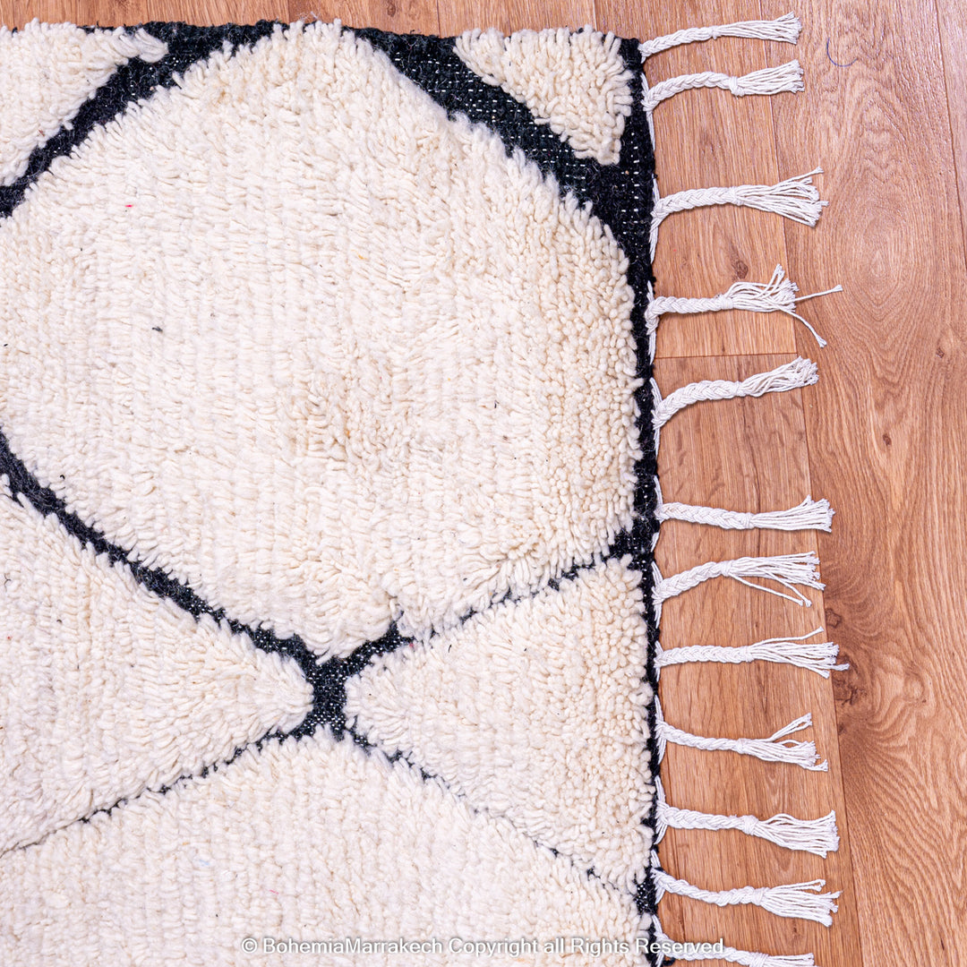 Hand-knotted Beni Ourain Moroccan wool rug in black and white diamond pattern