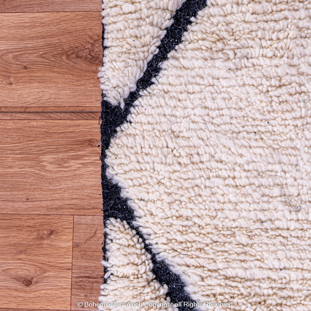 Hand-knotted Beni Ourain Moroccan wool rug in black and white diamond pattern