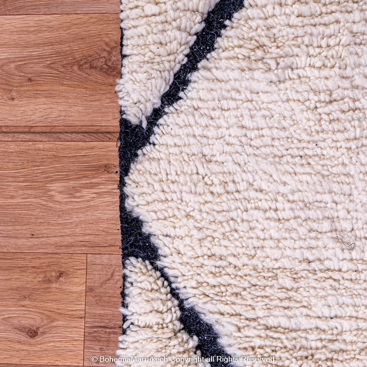 Hand-knotted Beni Ourain Moroccan wool rug in black and white diamond pattern