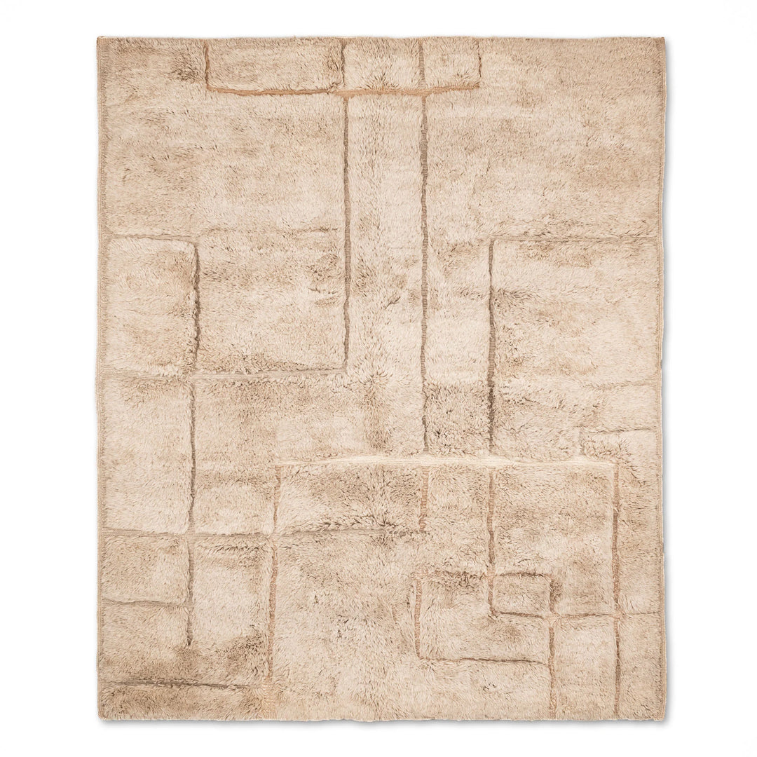 Neutral Moroccan wool rug with abstract Berber design, featuring beige tones and geometric patterns, handmade in Beni Mrirt style.