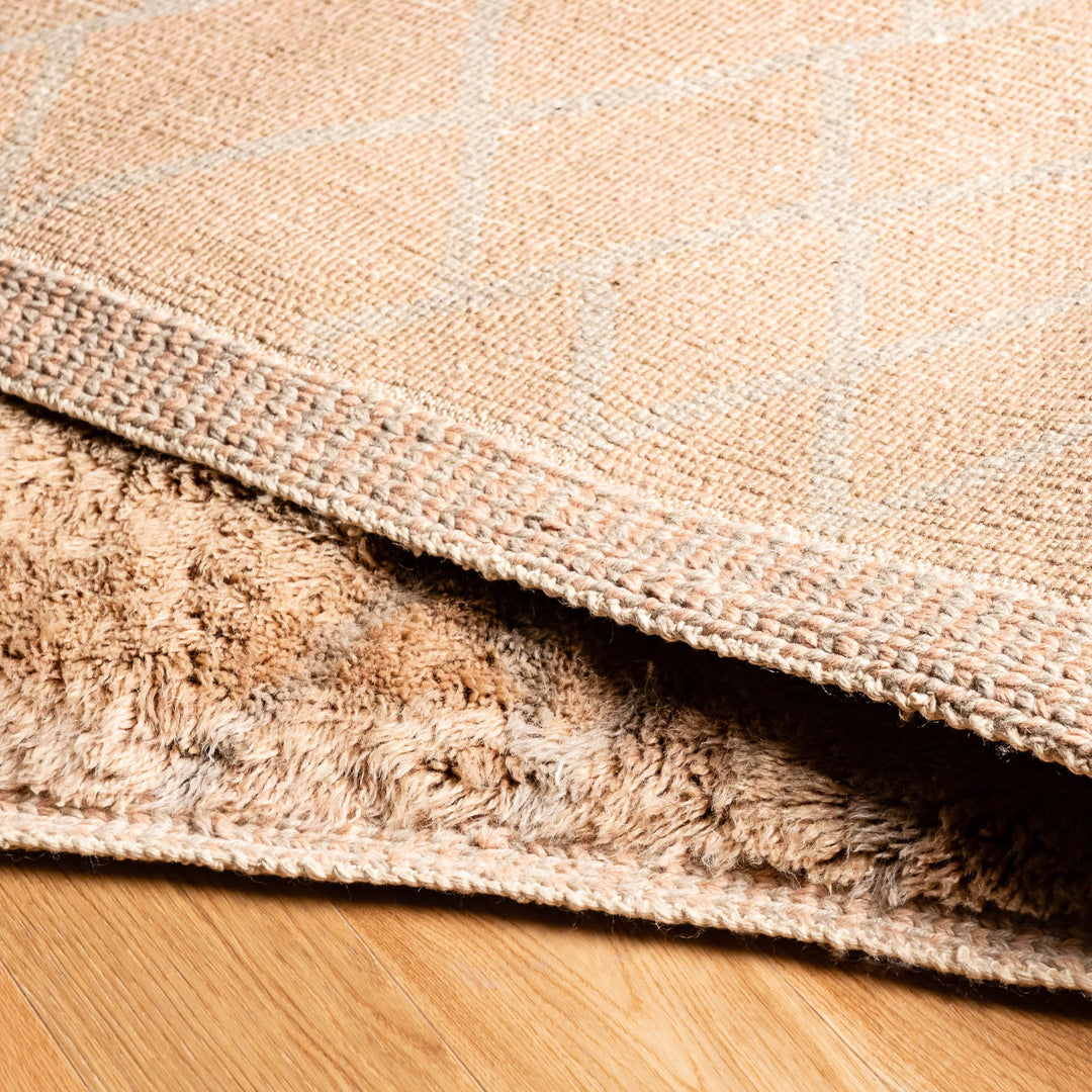 Solid Camel Beni Mrirt Rug, luxurious Moroccan wool shag, handwoven by Berber artisans, perfect for cozy minimalist or bohemian interiors.