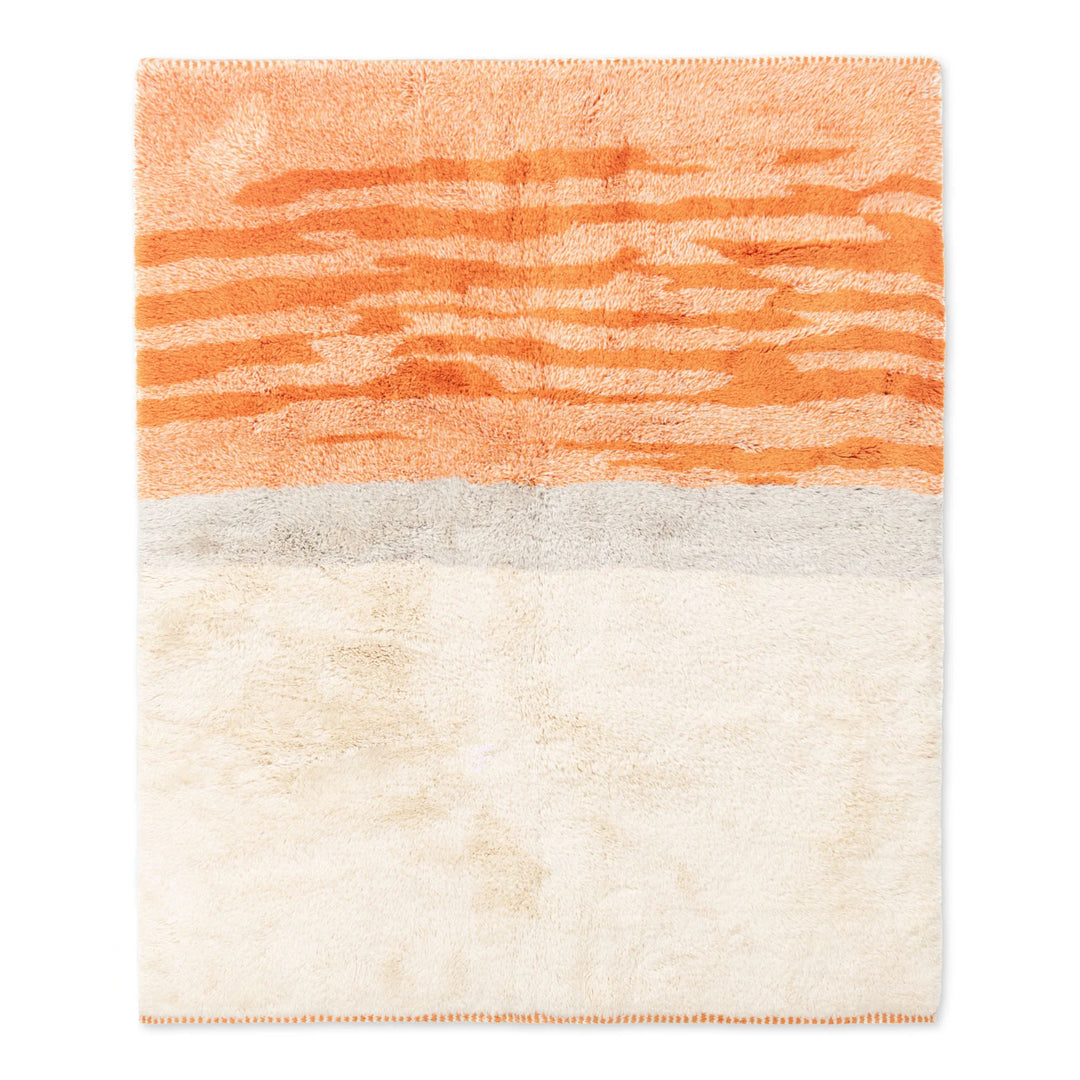 Sunrise Beni Mrirt Moroccan wool rug with warm orange and terracotta tones, handmade, inspired by desert dawn hues.