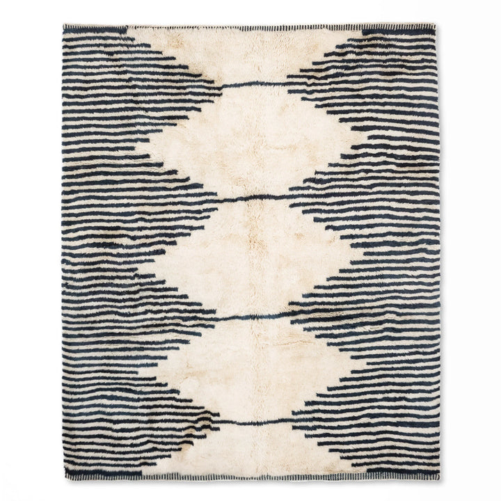 Wavy Striped Moroccan Wool Rug, black and ivory, handcrafted boho style, perfect for mid-century or minimalist decor. Available on Etsy.