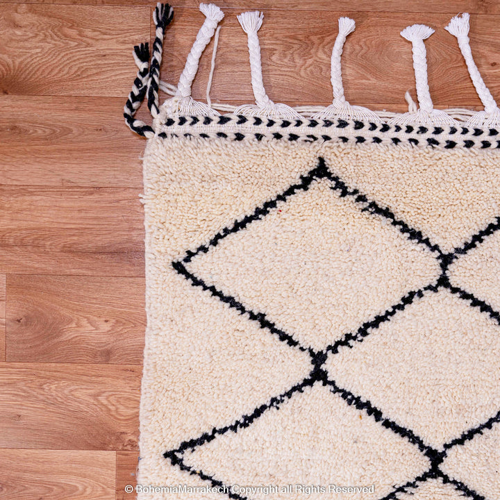 Handwoven Beni Ourain Moroccan rug in black and white wool with geometric diamond pattern