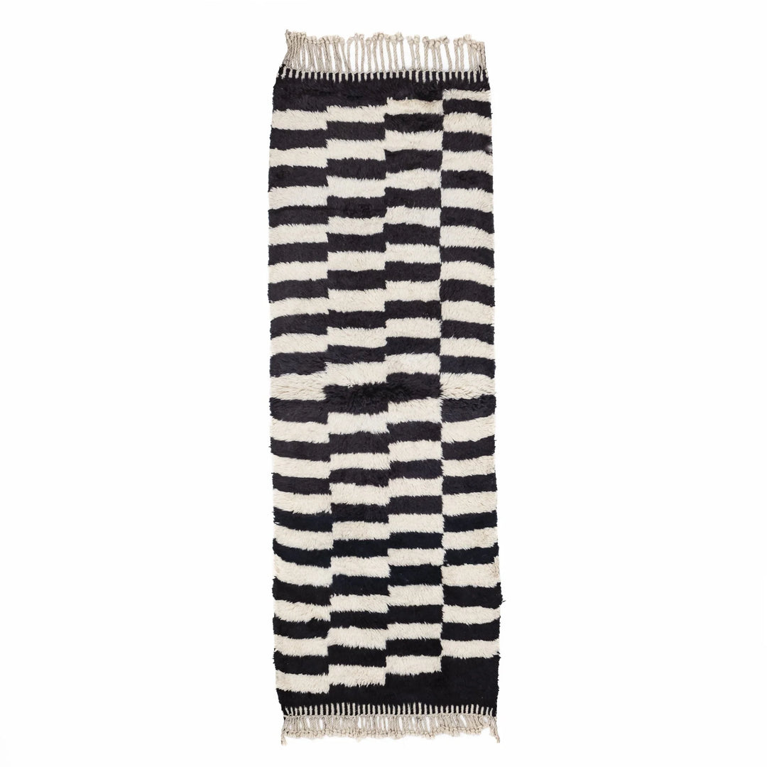 Black and white Moroccan Berber runner rug, handwoven with a traditional checkered pattern, perfect for hallways and entryways.