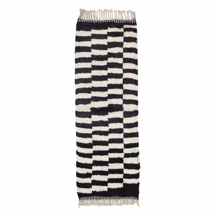 Black and white Moroccan Berber runner rug, handwoven with a traditional checkered pattern, perfect for hallways and entryways.