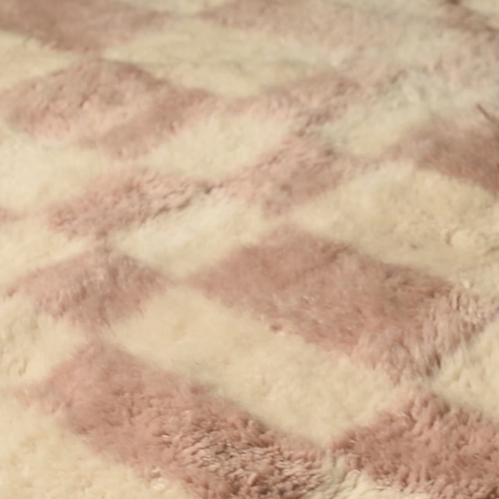 Close-up of a Neutral Checkerboard Beni Mrirt Rug made from Moroccan wool, featuring a beige checkerboard pattern.