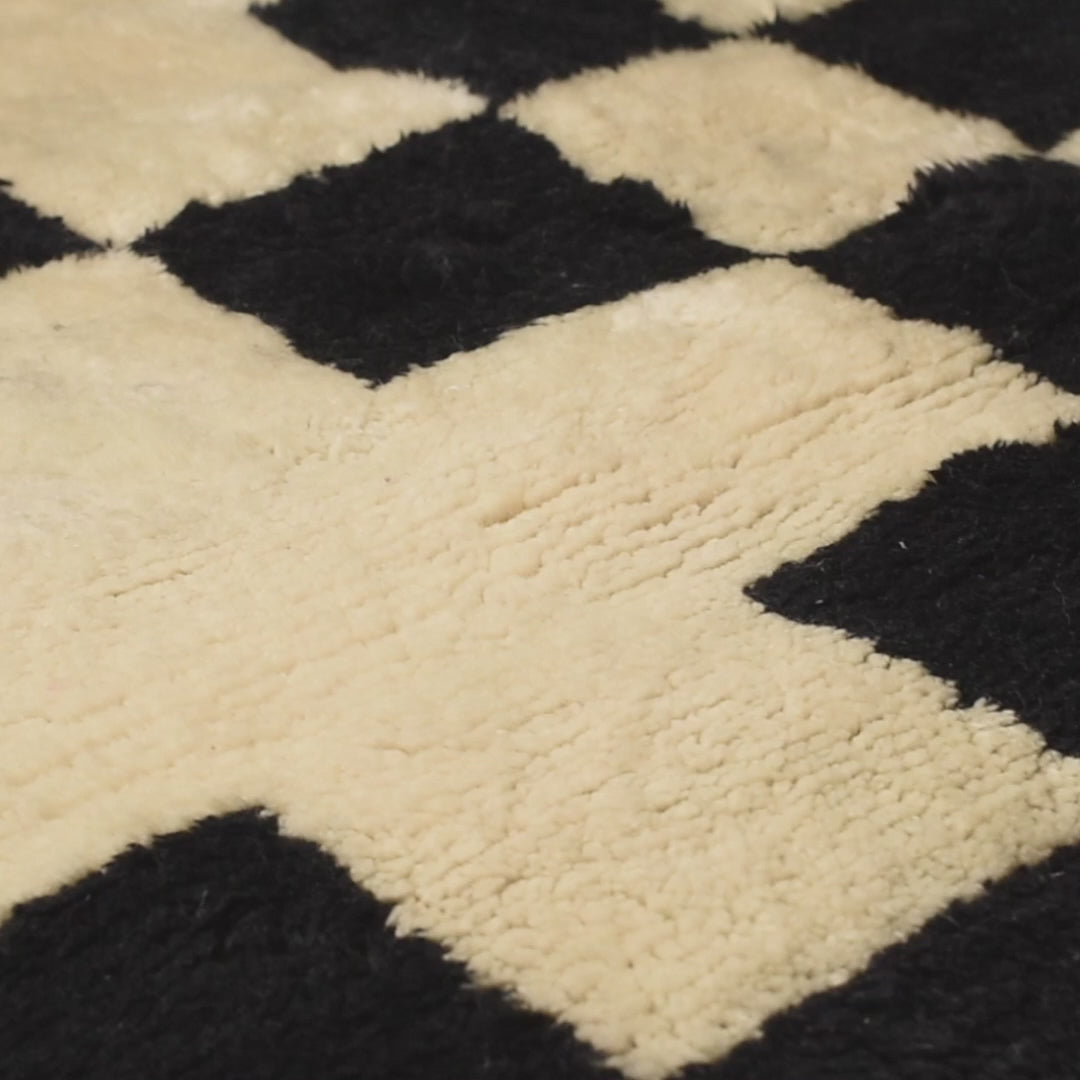 Modern Beni Mrirt Moroccan Berber Rug with black and ivory checkerboard design, handwoven from fine Moroccan wool.