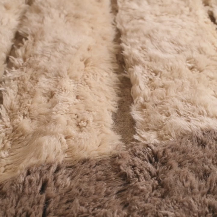 Custom Beni Mrirt rug with hourglass shaved wool design, handmade Moroccan rug with cream and beige tones.