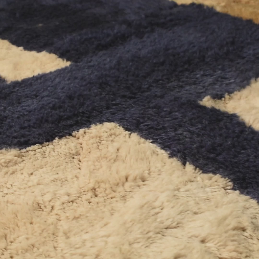 Bold Abstract Beni Mrirt Rug in blue and mustard, handwoven Moroccan wool rug showcasing traditional Berber geometric design.